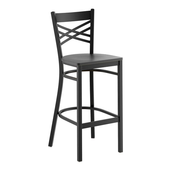 A black metal bar stool with a cross back design and a black wood seat.