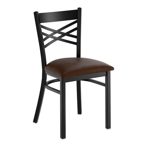 A black metal cross back chair with a dark brown vinyl padded seat.