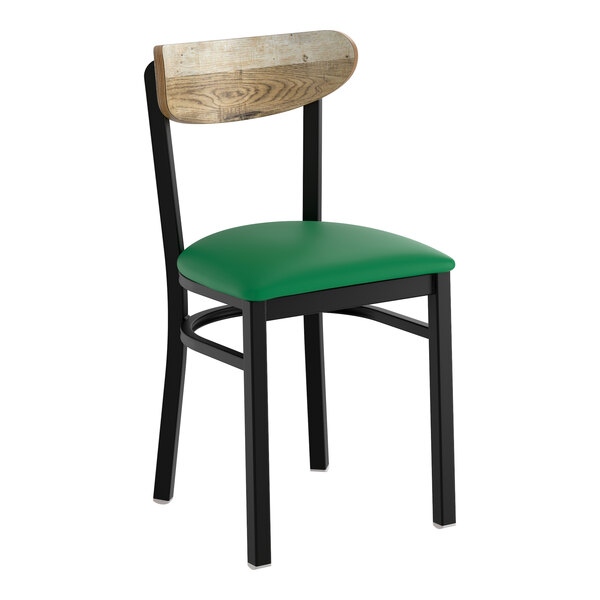 A black metal chair with a green vinyl seat and a driftwood-finished wooden backrest.