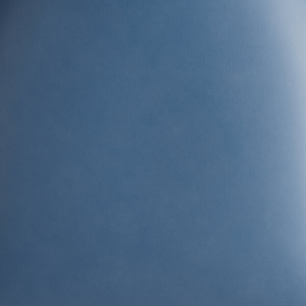 A chair with a navy vinyl seat, antique walnut wood back, and black finish.