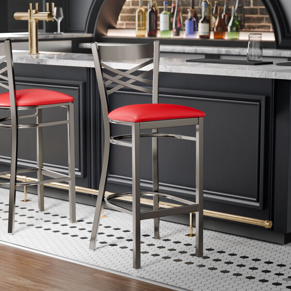 Lancaster Table & Seating Clear Coat Finish Cross Back Bar Stool with 2 1/2" Red Vinyl Padded Seat