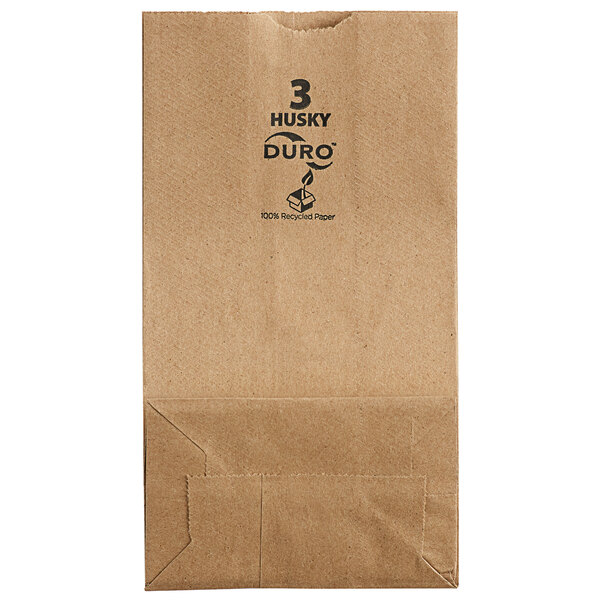 A brown Duro paper bag with a logo that reads "Husky Dubl Life 3 lb."