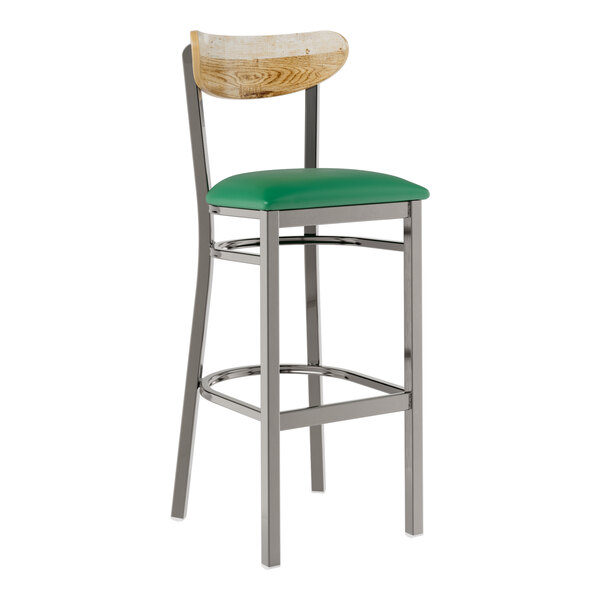 A Lancaster Table & Seating bar stool with a green vinyl seat and metal legs.