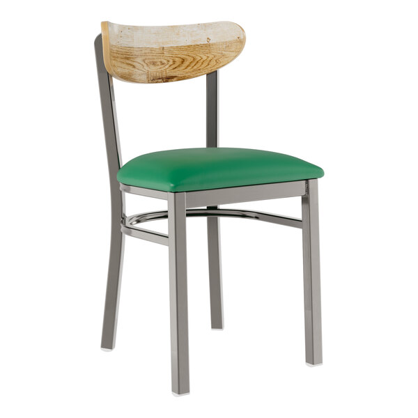 A Lancaster Table & Seating Boomerang chair with a green vinyl seat and driftwood back and metal legs.