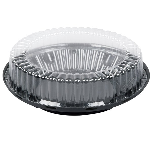 A black plastic pie container with a clear high dome lid.