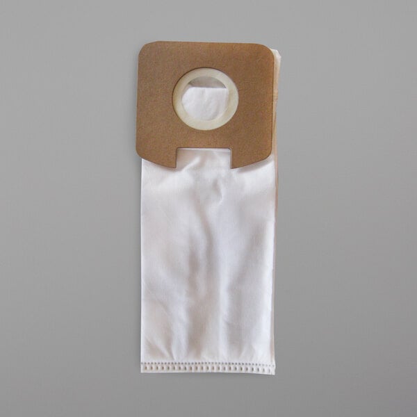 A close-up of a white bag with a brown clip.