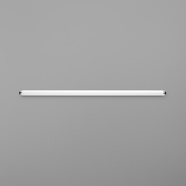 A white tube light bulb on a gray background.