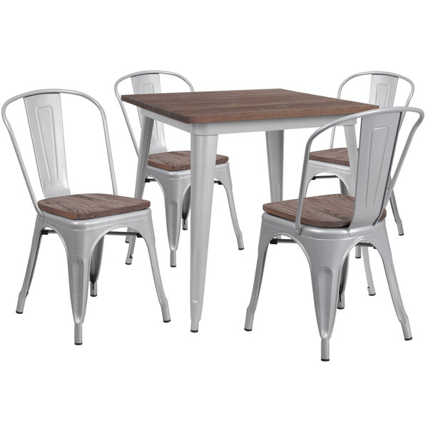 A Flash Furniture galvanized steel and wood table with 4 chairs.