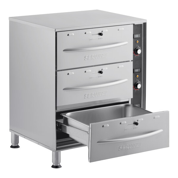 A triple freestanding stainless steel drawer warmer with three pull-out drawers and control knobs on the side.