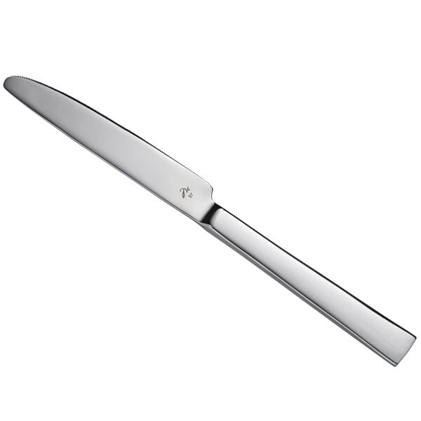 A silver knife with a black handle.