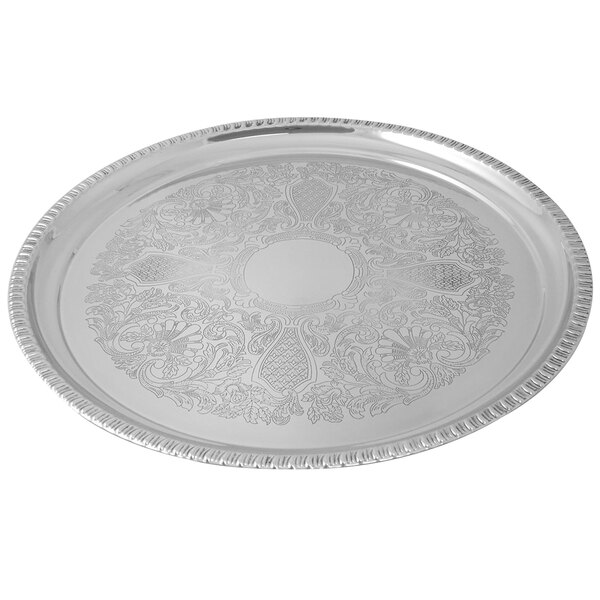 a silver tray with a design