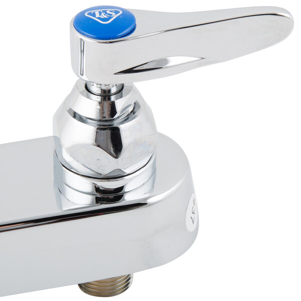 A T&S chrome deck mounted faucet base with blue accents.