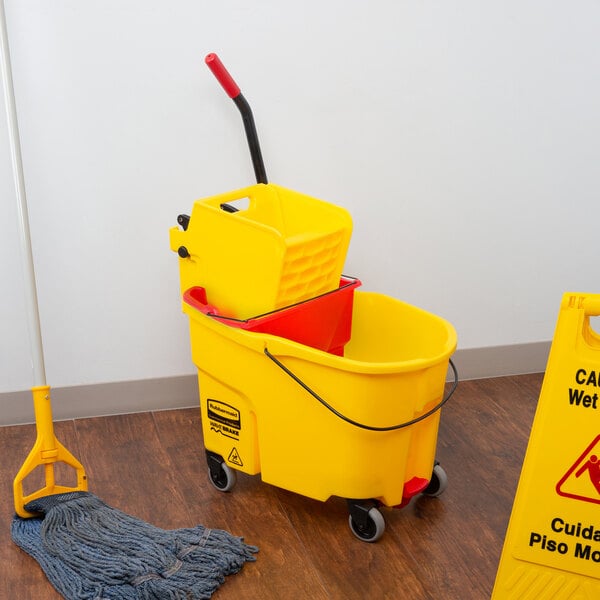 a yellow sign with a red triangle and black text