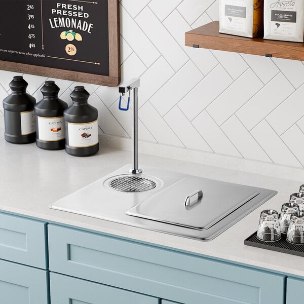 A Delfield drop-in water station with ice storage.