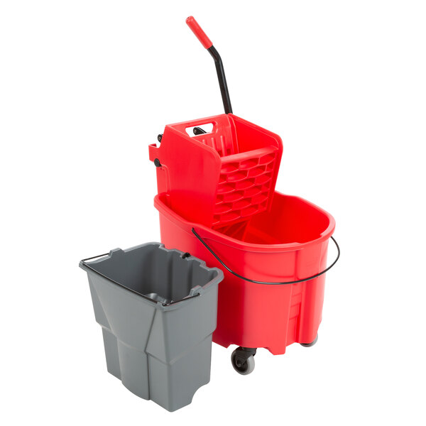 a grey bucket with a red handle