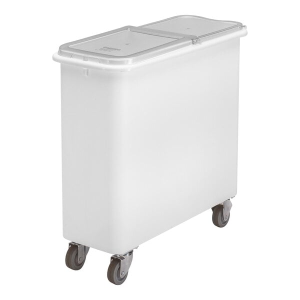 A white mobile ingredient storage bin with a flat top, two-piece sliding lid, and four caster wheels.