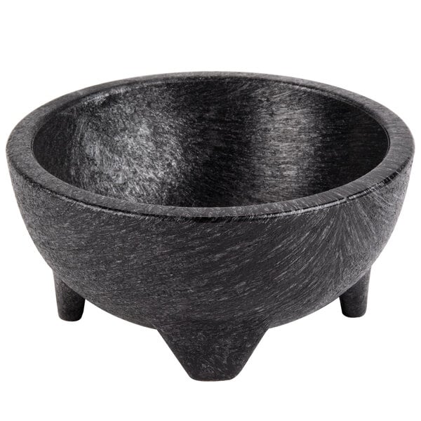 A black polypropylene molcajete bowl with legs.