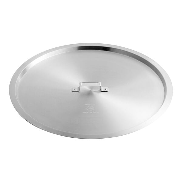 A large round aluminum pot or pan cover with a flat handle in the center.