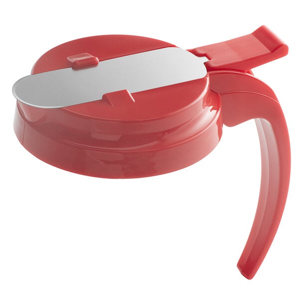 a red lid with a knife on it