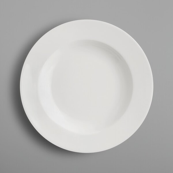 A RAK Porcelain ivory deep plate with a circle on the rim on a white background.