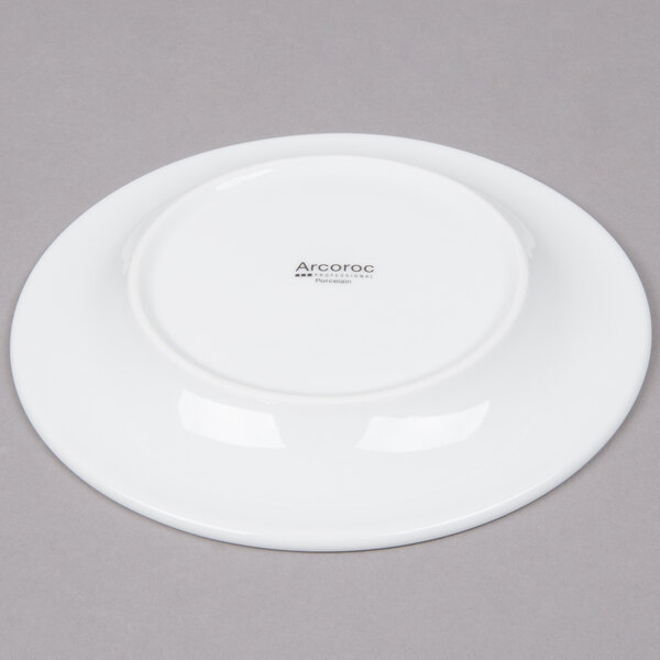 A white Arcoroc Candour porcelain saucer with a small white rim.