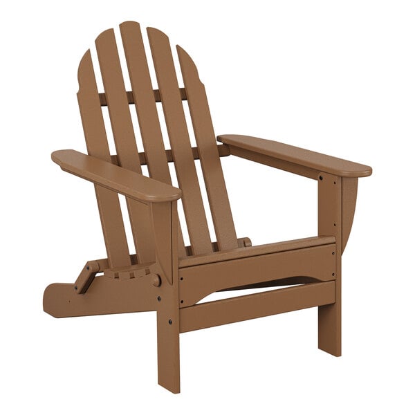 A teak POLYWOOD classic Adirondack chair with armrests.