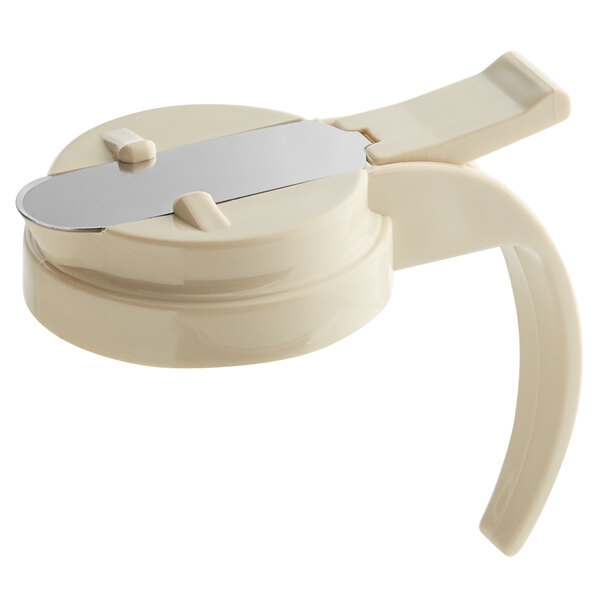 A Vollrath almond plastic lid with a metal blade.