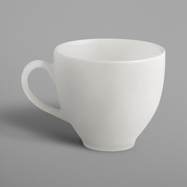 A white RAK Porcelain cup with a handle.