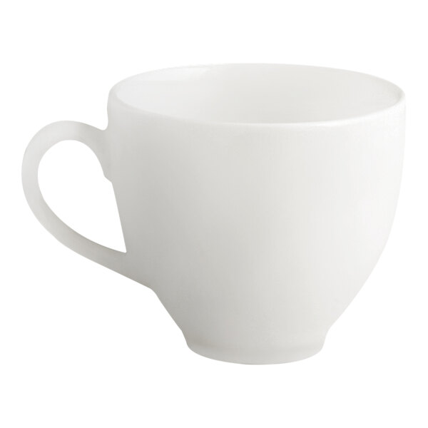 A plain ivory porcelain cup with a handle.