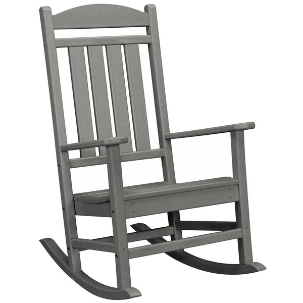 A POLYWOOD slate grey rocking chair with armrests.