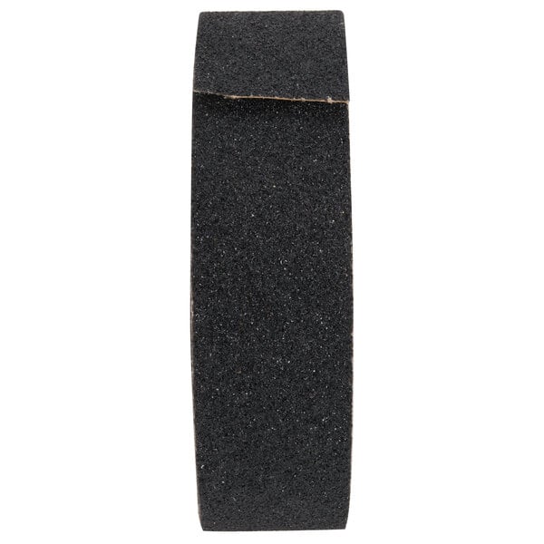 A black roll of FMP nonskid safety tape on a white background.