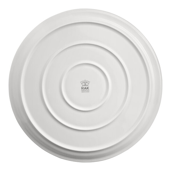 A white RAK Porcelain pizza plate with a circle design.