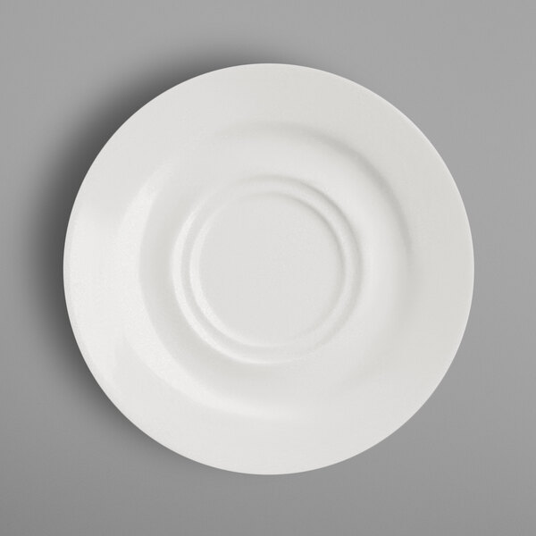 a white plate with a circular pattern