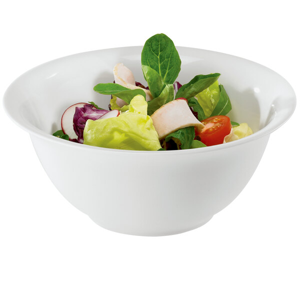 A RAK Porcelain ivory china bowl filled with salad.