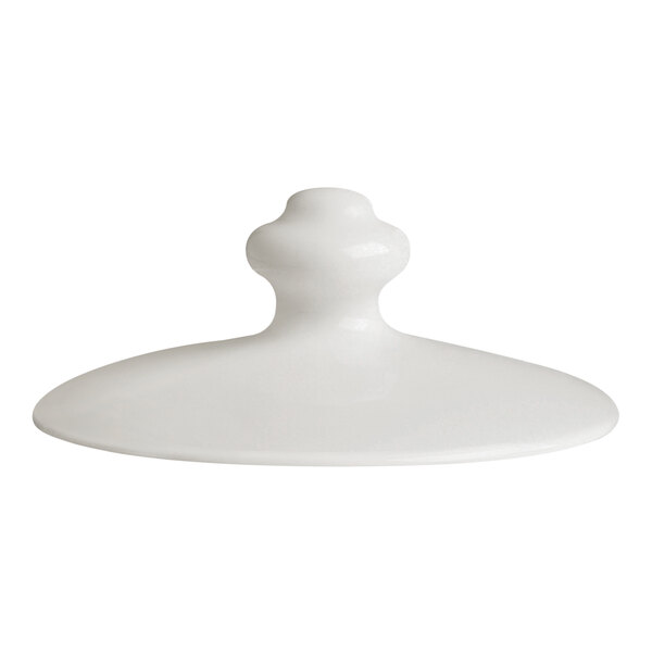 A white porcelain teapot lid with a rounded knob handle.