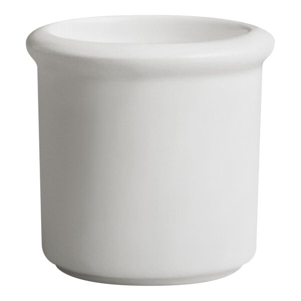 A small ivory porcelain toothpick holder with a simple cylindrical design.
