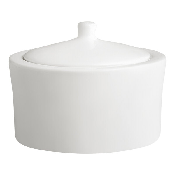 A white porcelain sugar bowl with a matching lid.