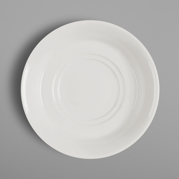 a white plate with a circular pattern