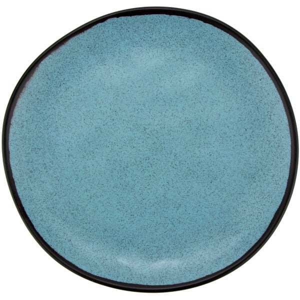 a blue plate with black rim