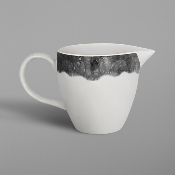 a white and black cup