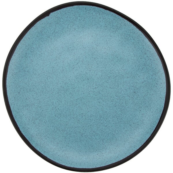 A matte speckled blue melamine coupe dinner plate with a black rim.