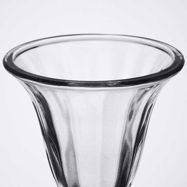 A clear Libbey tulip sundae glass with a black rim.
