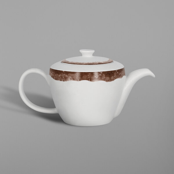 a close up of a white coffee mug