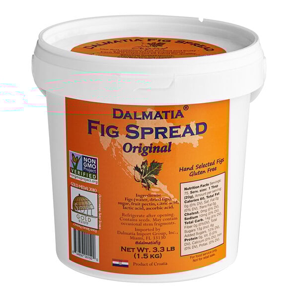 A white Dalmatia container with an orange label for 3.3 lbs of Original Fig Spread.