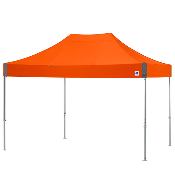 An orange E-Z Up canopy with a steel frame.