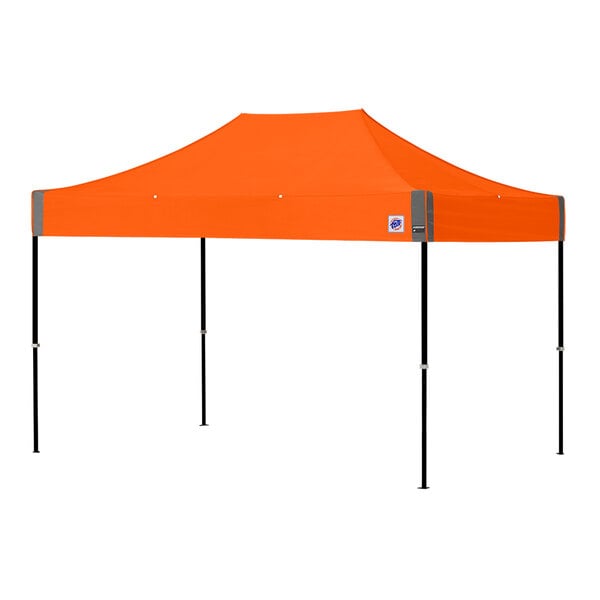 An orange canopy with black poles.