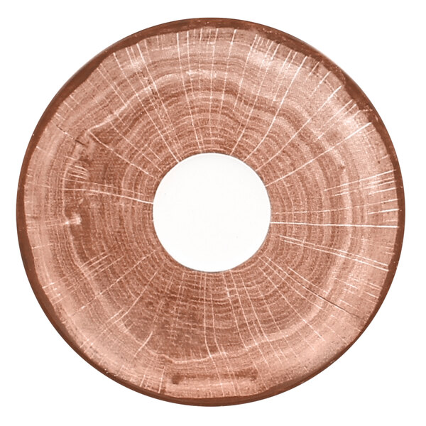 A white circle in a brown circle on a RAK Porcelain Walnut Brown espresso cup saucer.
