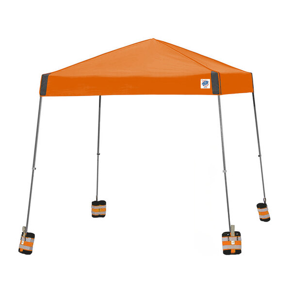 an orange tent with two legs