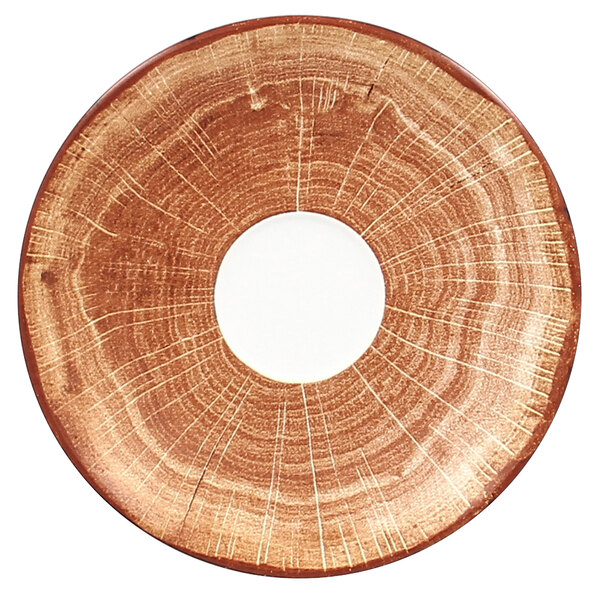 A circular wood plate with a white circle in the center.