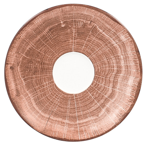 a white plate on a brown surface